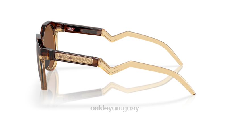 Oakley kylian mbappe serie firma hstn (ajuste de puente bajo) XT4H785 gafas Lentes Prizm de tungsteno, montura ámbar oscuro/curry claro.