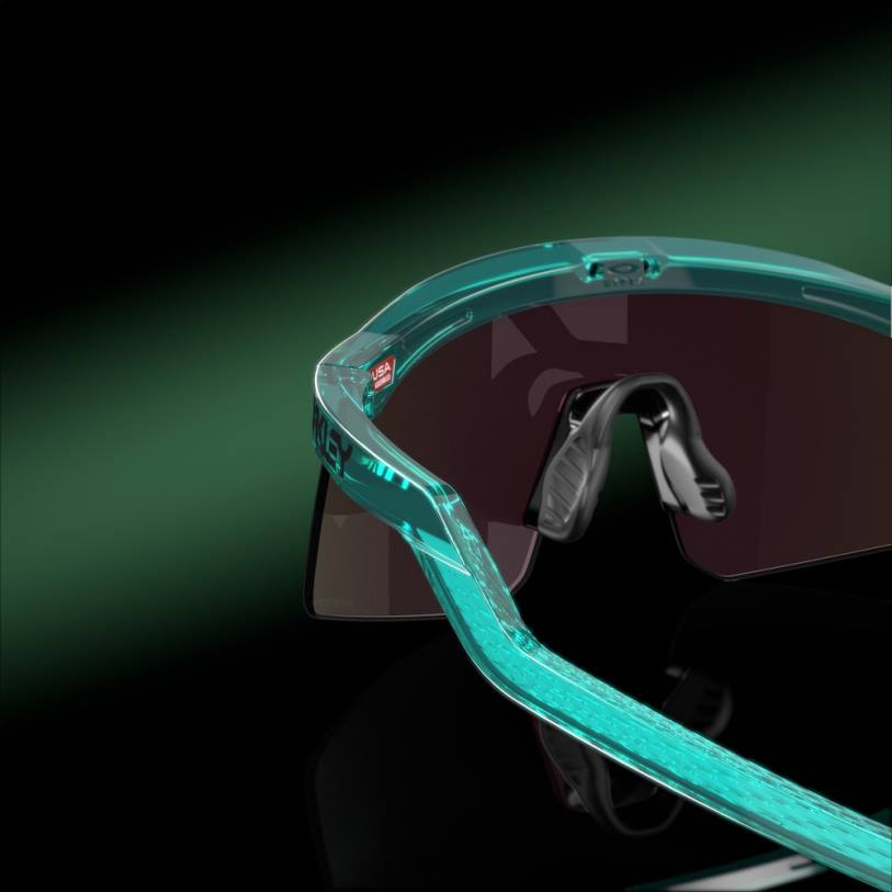 Oakley hidra XT4H148 gafas lentes prizm de zafiro, montura trans artic surf